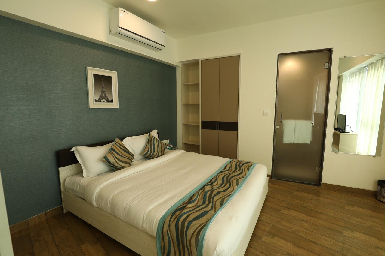 Rajhans Belliza Service Apartment Сурат Екстер'єр фото