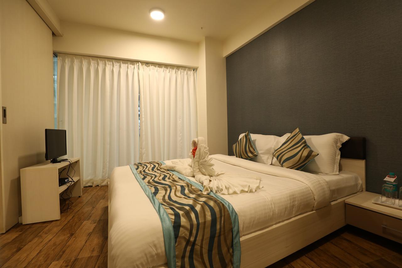 Rajhans Belliza Service Apartment Сурат Екстер'єр фото